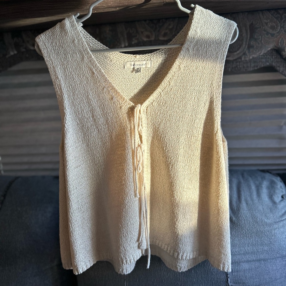 Francesca's Collections cream-colored knit tie-front sleeveless cardigan vest. 